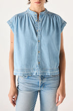 Load image into Gallery viewer, Light blue denim shirt worn by a person on a white background AMO DENIM TOP