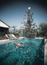 Load image into Gallery viewer, Piecework Puzzle Christmas Swim By Slim Aarons Puzzle