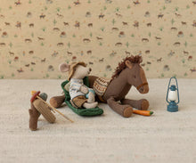Load image into Gallery viewer, Stuffed mouse in cowboy hat and boots sitting on a horse with a lantern and carrot on a patterned background