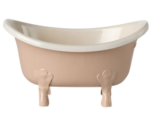 Load image into Gallery viewer, Beige freestanding bathtub with white interior on a white background
