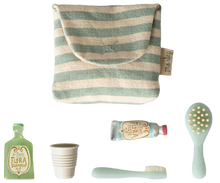Load image into Gallery viewer, Set of eco-friendly products including a striped pouch, bottle, cup, tube, and brush on a white background.