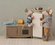 Load image into Gallery viewer, Two toy mice in a kitchen setting with a refrigerator and sink.