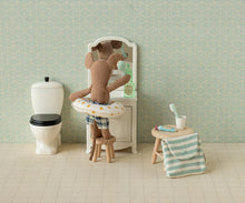 Load image into Gallery viewer, Stuffed teddy bear in a bathtub with a stool and towel in a bathroom setting