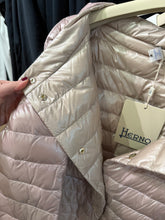 Load image into Gallery viewer, Beige quilted jacket with a Herno tag on a hanger