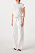 Load image into Gallery viewer, Person wearing a white t-shirt and white pants on a light gray background